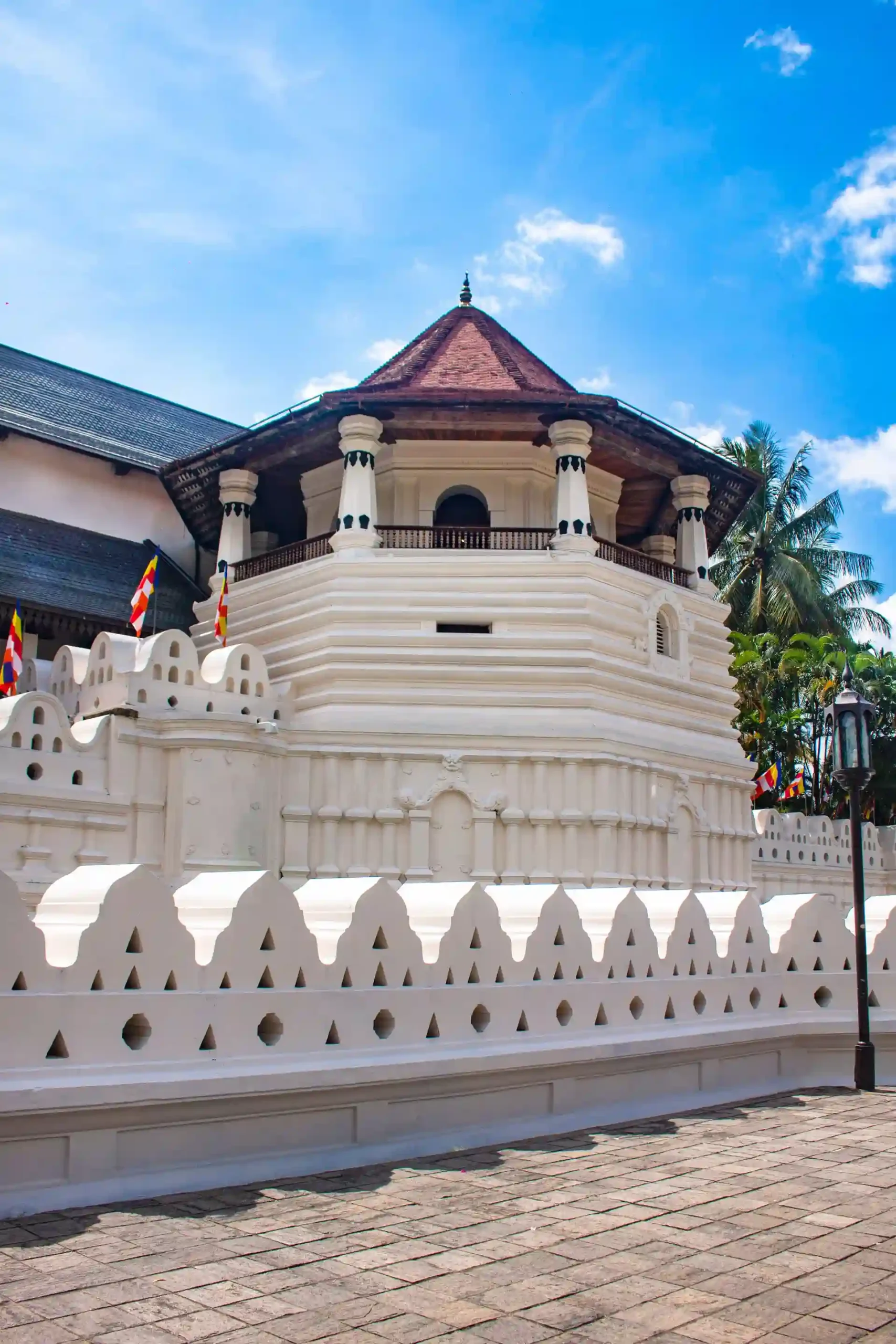 Temple of the Sacred Tooth Relic overlooking Kandy Lake
