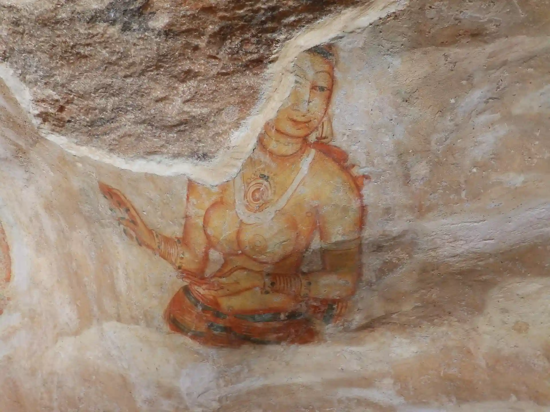 Visitors climbing Sigiriya Rock Fortress in Sri Lanka
